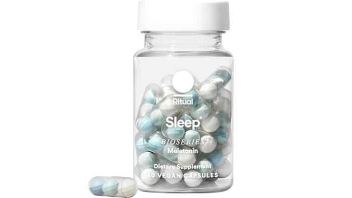 A bottle of Ritual Sleep BioSeries Melatonin capsules against a white background.